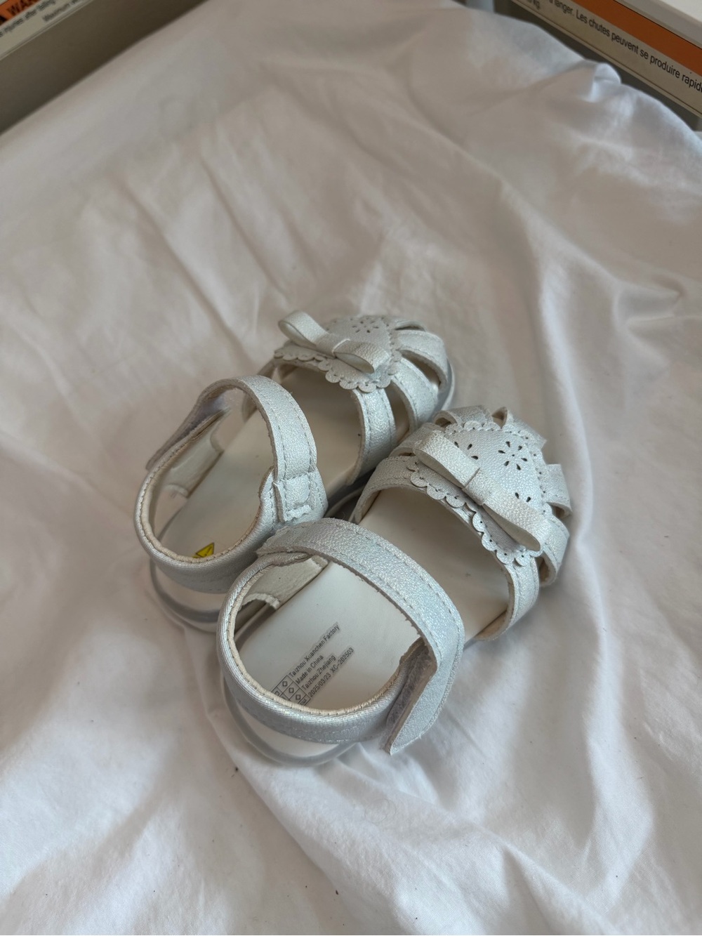 Kids Metallic White Sandals with Bow Accent